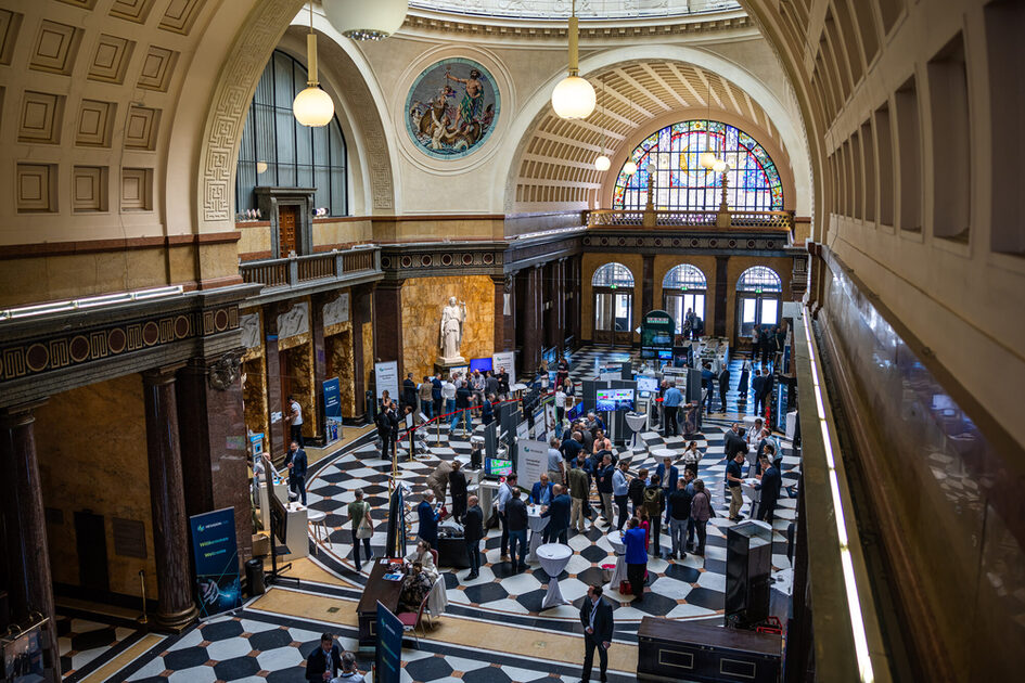 Event participants in the Kurhaus foyer