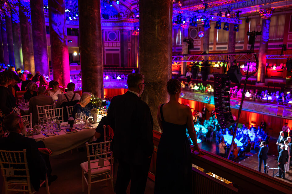 A woman and a man during an evening event