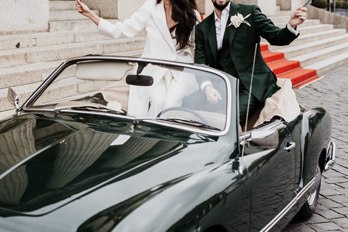 Bride and groom in the car
