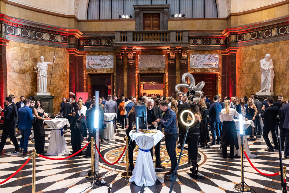 Event guests in the foyer of the Kurhaus