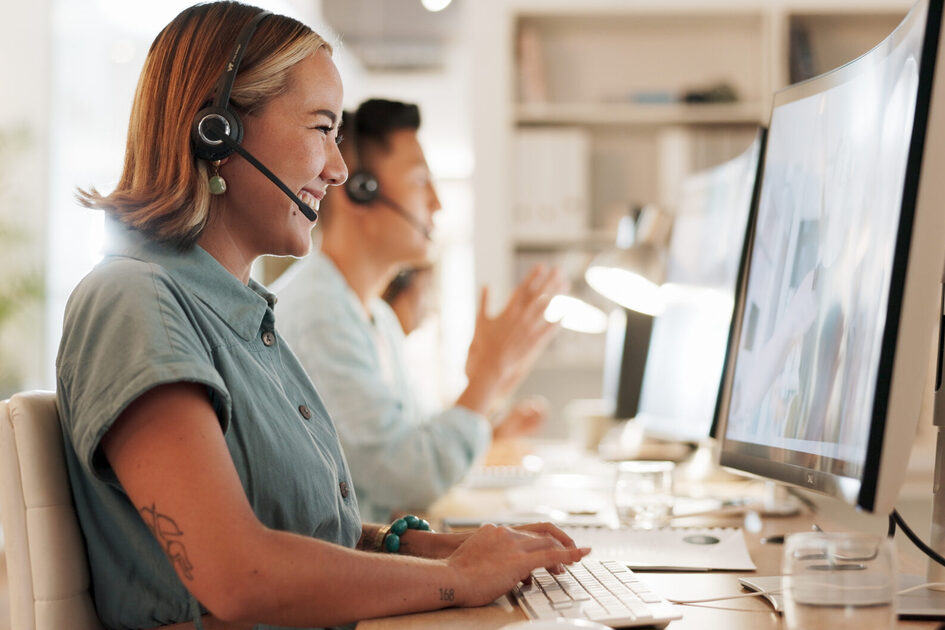 Call center, consulting and laughing with woman in office for contact us, communication and customer service. Salesman, help desk and technical support with person in crm agency for telemarketing